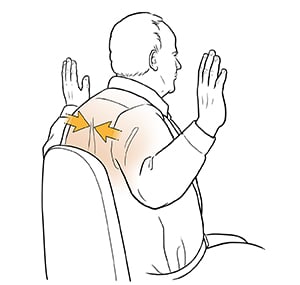 Man doing back press exercise.